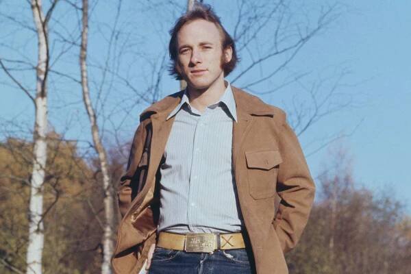 Stephen Stills posed beside a garden pond at his home in Guildford, Surrey, 15th November 1970.