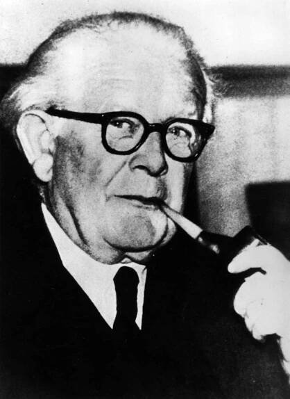 Jean Piaget smoking a pipe