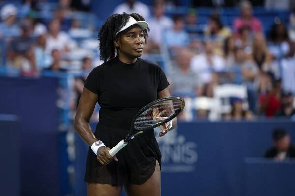 Venus Williams receives a wild-card entry with Reilly Opelka to play mixed doubles at the US Open