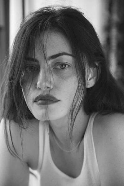 a black and white photo of a woman