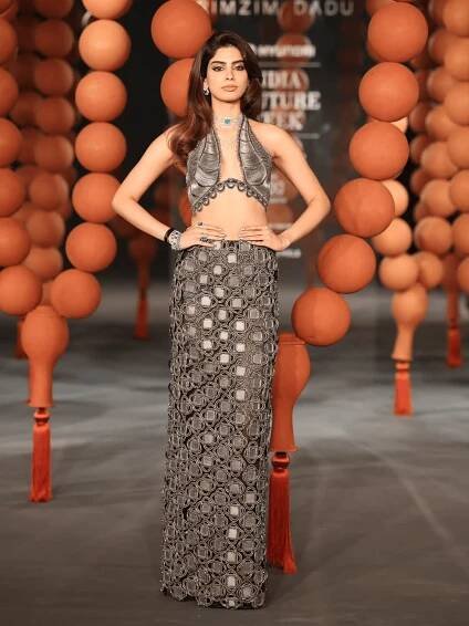 Image may contain Sonia Hussain Fashion Adult Person Formal Wear Clothing and Dress