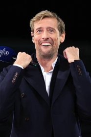 Crouch celebrating on the touchline during Liverpool&apos;s clash with Real Madrid in February