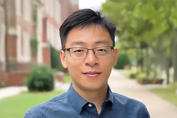 A headshot of Dong Zhang. 