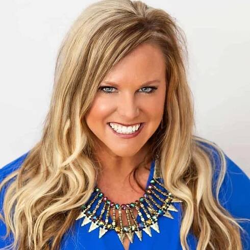 Beach Body Leader Cory Miller wearing a SunSpray by Kathryn Airbrush Tan