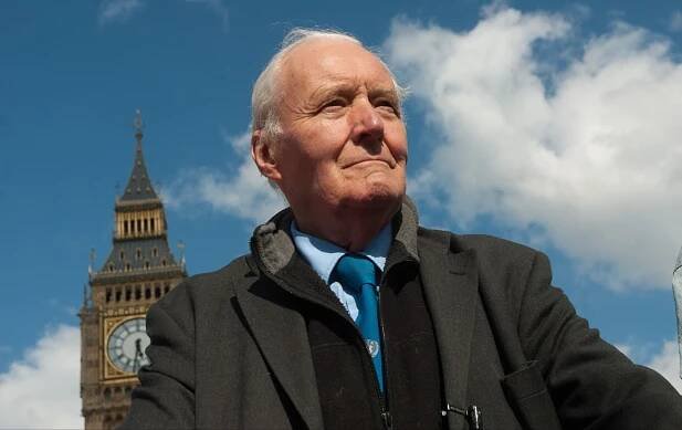 Tony Benn (1925-2014) addresses a crowd in Parliament Square, London during a demonstration by the Stop the War Coalition against the foreign war policies of George W. Bush, during the U.S President's visit as part of his European farewell tour, 15th June 2008.
