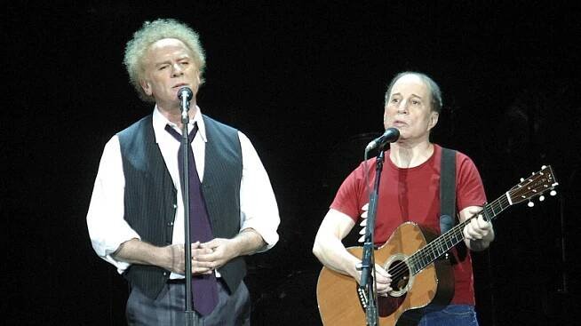 Paul Simon and Art Garfunkel on stage