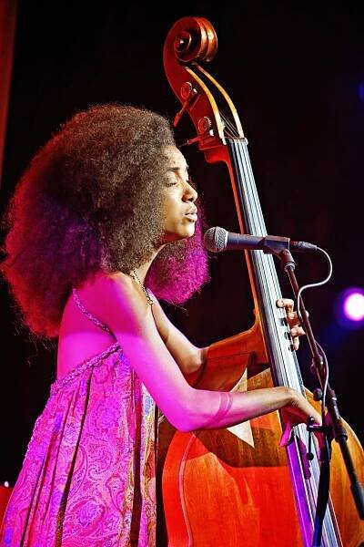 Academy of Achievement youth delegate Esperanza Spalding mesmerizes the audience at the 2014 International Achievement Summit in San Francisco with her expressive singing and inventive bass playing.