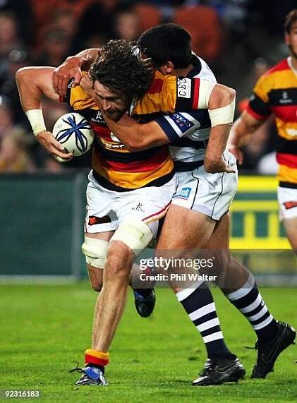 Toby Lynn of Waikato is tackled by Paul Williams of Auckland during the Air New Zealand Cup match between Waikato and Auckland at Waikato Stadium on...