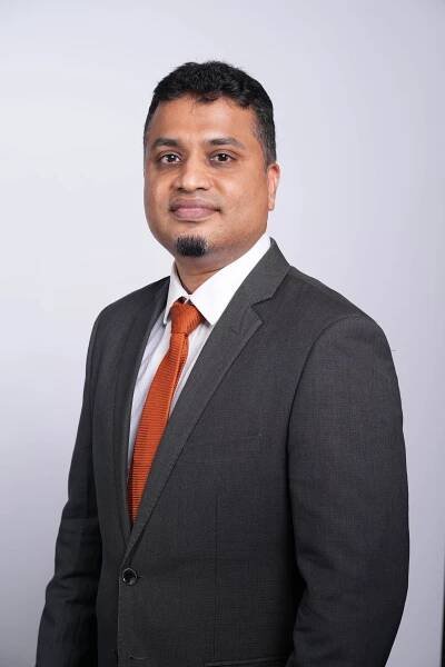 Professional headshot of Alvin Pereira, Finance & Admin Director at Rebound.
