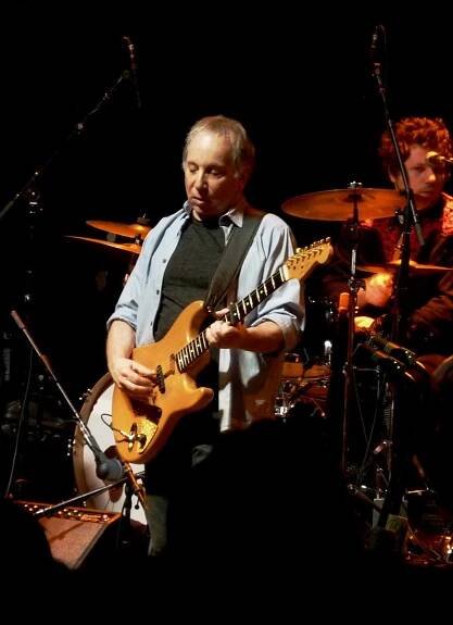 Paul Simon uses a capo