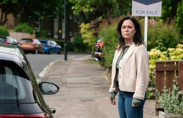 Emma Barnett (Jill Halfpenny) Emma watching the prospective buyer. TV Still Paramount