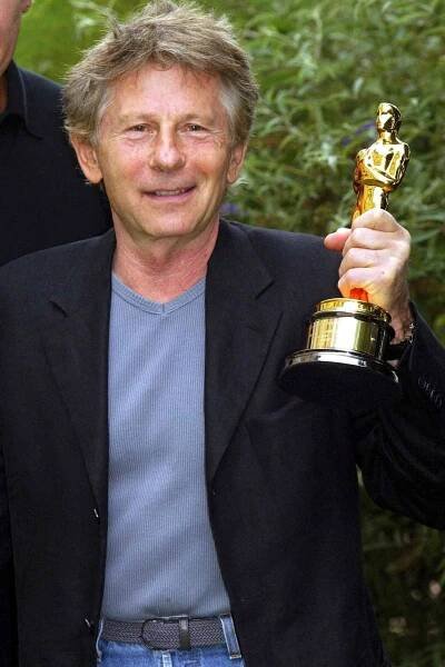 Roman Polanski with his 2003 Academy Award for Best Director.