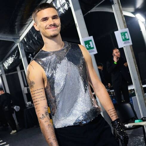 Romeo Beckham Makes A Surprise Appearance On The Versace AW25 Catwalk In Silver Chainmail