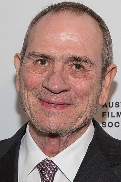 An Energetic Tommy Lee Jones Unleashing a Brilliant Smile Wallpaper