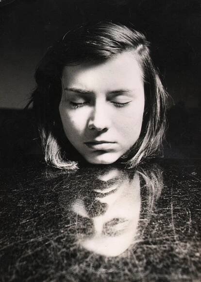 Woman's face with eyes closed