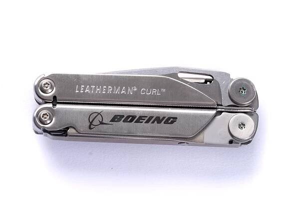 The Boeing Leatherman Curl, featuring Leatherman Curl on one side and the Boeing logo on the other, comes with a pocket clip and is photographed against a white background. Brand: The Boeing Store.