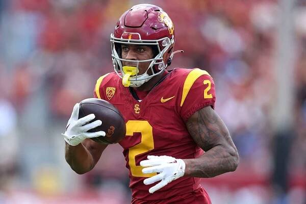 Brenden Rice #2 of the USC Trojans runs the ball after a reception during the first half of a game against the UCLA Bruins