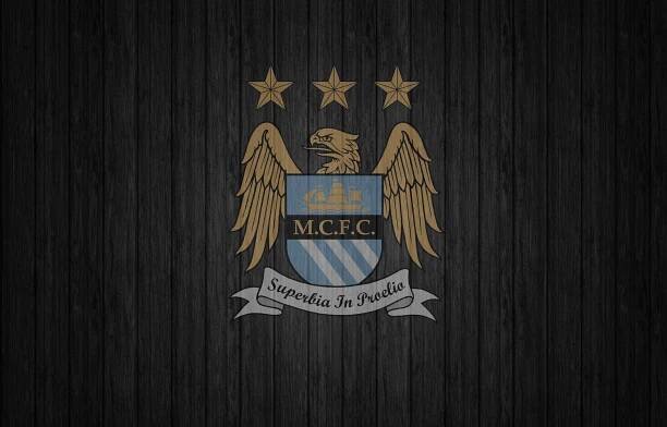 Download Manchester City 4k Eagle Shield Logo Wallpaper