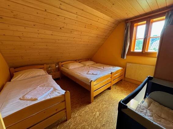Postel nebo postele na pokoji v ubytování Apartmány Podťaté