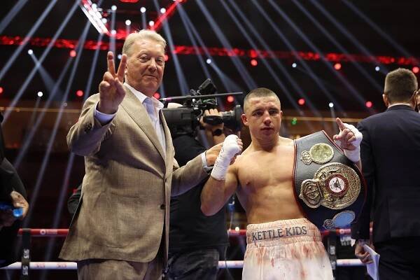 Nick Ball of Team Queensberry with Frank Warren after a boxing victory.