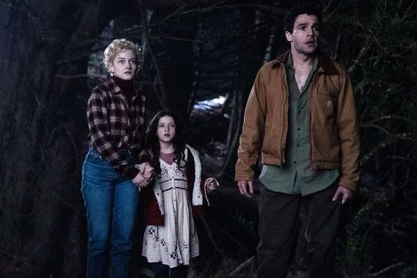 from left) Charlotte (Julia Garner), Ginger (Matilda Firth) and Blake (Christopher Abbott) in Wolf Man, directed by Leigh Whannell.