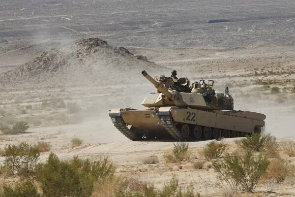 An M1A2 Abrams Battle Tank is shown.