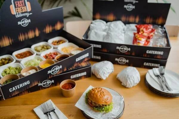 a burger and other food on a table