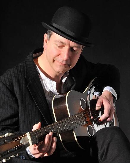 Michael playing resonator guitar