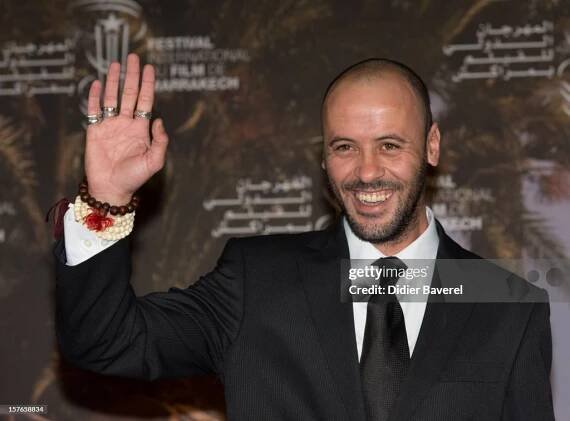 Actor Ali Suliman poses during a photocall for the movie " The...