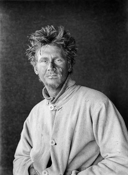 A frostbitten Charles Wright at camp after returning from the Great Ice Barrier as part of the first support party aiding Scott's push to the South Pole. January 1912.