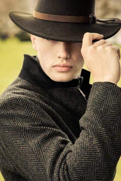 Wide brim Boston felt hat in brown and donegal  Green white jacket with Flecs