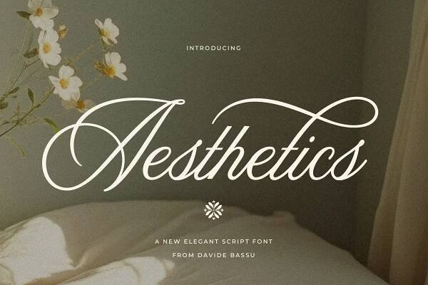 a bed with white sheets and flowers on it, next to the words aesthetics written in cursive font