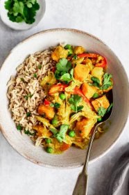 slow cooker yellow chicken curry in a bowl