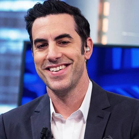 Sacha Baron Cohen's Fake Conspiracy Site Is Fully Post-Parody
