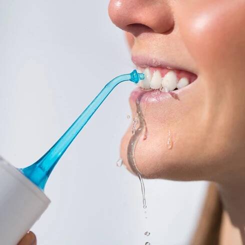 Using A Water Flosser for Oral Health