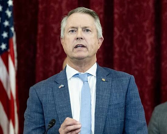 U.S. Senator Roger Marshall in a suit speaking with Republican senators at a press conference about America standing with Israel at the U.S. Capitol