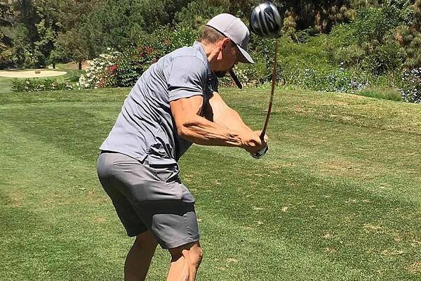 Steve Howey playing golf