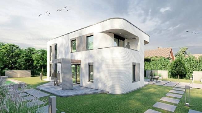 První dům z 3D tiskárny už staví i v Německu. Vypadá jako běžný rodinný domek, jen má kulaté tvary
