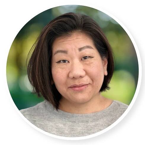 A woman with short brown hair