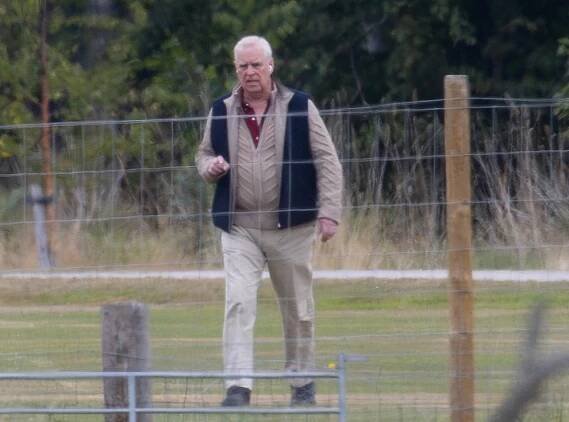 As all the family head out on a Grouse shoot at Balmoral Prince Andrew heads out on his own to walk his dogs. © Bruce Bennett