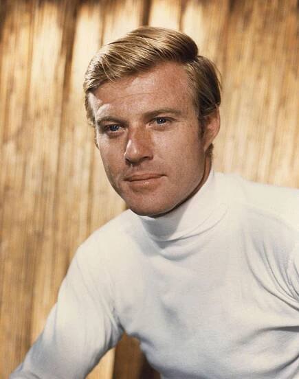 Robert Redford In A Studio Portrait Wearing A White Sweater In The 1960S.