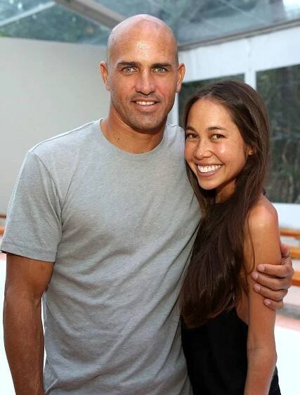 MIAMI, FL - JULY 19: Professional surfer Kelly Slater and designer Kalani Miler attend the Mikoh fashion show during Mercedes-Benz Fashion Week Swim 2015 at Oasis at The Raleigh on July 19, 2014 in Miami, Florida. 