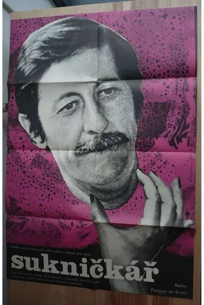 Sukničkář (filmový plakát, film Francie 1979, režie Philippe de Broca, Hrají: Jean Rochefort, Nicole Garcia, Jean Desailly
