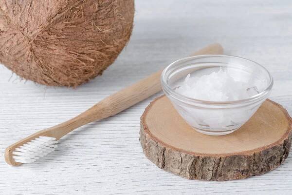 What is oil pulling? Experts warn against coconut oil oral health hack