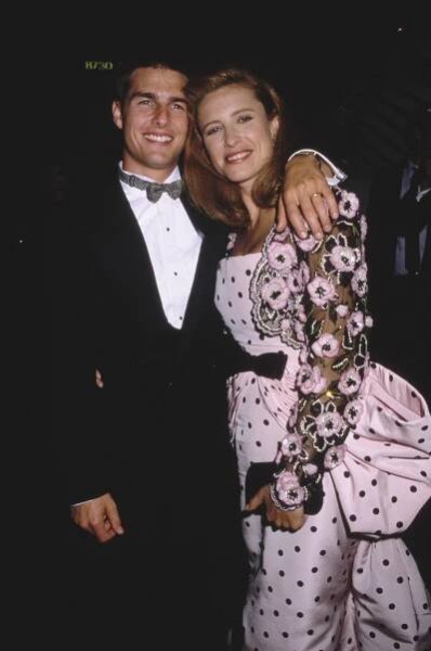Tom Cruise and Mimi Rogers posing together