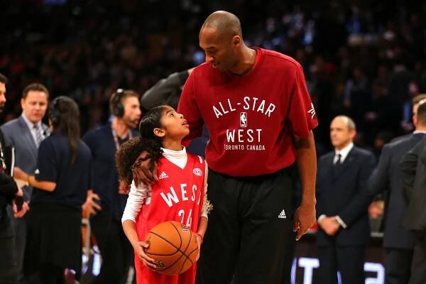 Kobe Bryant paved the way for male athletes to be proud dads.