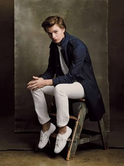 Image may contain Clothing Apparel Footwear Human Person Shoe and Ansel Elgort