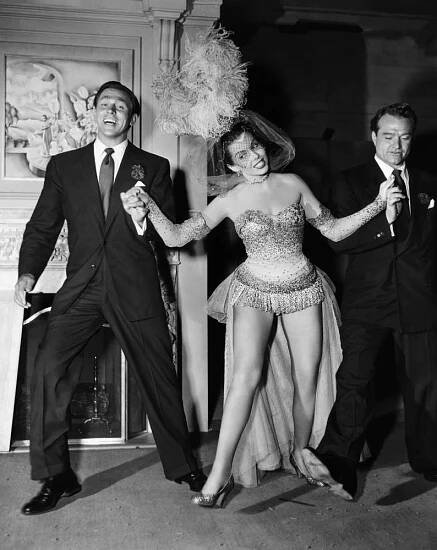 LOVELY TO LOOK AT, from left, Howard Keel, Ann Miller, Red Skelton, cutting up between takes, 1952