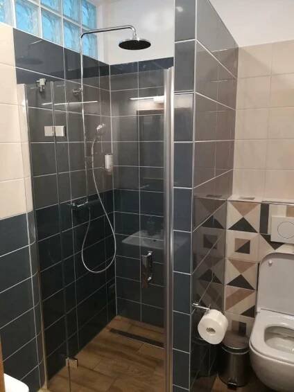 Koupelna v ubytování Apartmány U Holubů