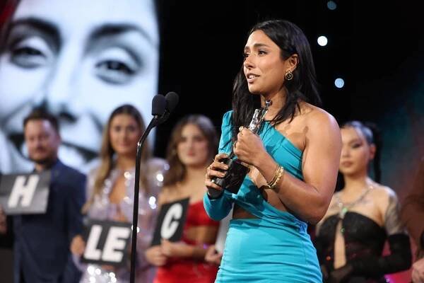 Michelle Khare accepts the "Show of the Year" award at the Streamys (Courtesy of @streamys on X, formerly known as Twitter)